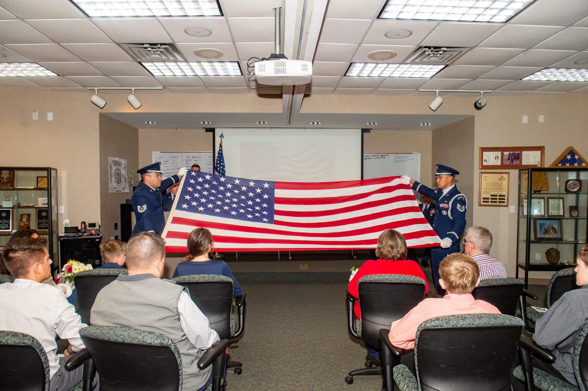 The Grissom Base Honor Guard flag during Chief Master Sgt. Michael Morris’, 434th Communications Squadron senior enlisted leader, retirement ceremony at the 434th CES building on Grissom Air Reserve Base, Indiana on Jan. 21, 2023. Morris was celebrated at the ceremony after 22 years of military service. (U.S. Air Force photo by Staff Sgt. Michael Hunsaker)