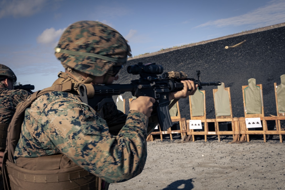 A U.S. Marine with 7th Communication Battalion, III Marine Expeditionary Force Information Group, fires his M4 carbine during a field exercise on Camp Hansen, Okinawa, Japan, Jan. 26, 2023. The purpose of this exercise is to increase lethality and readiness of Marines within the unit. III MIG functions as the vanguard of III MEF, operating in the Indo-Pacific regions information environment, and supports Marine Air Ground Task Force operations with communications, intelligence, and supporting arms liaison capabilities.
