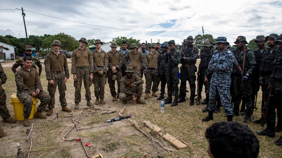 U.S. Marines with Combat Logistics Battalion 13, 13th Marine Expeditionary Unit, and Sri Lankan marines brief the route plan during a Humanitarian Assistance and Disaster Relief exercise, Jan. 23 in Mullikulam. CARAT/MAREX Sri Lanka is a bilateral exercise between Sri Lanka and the United States designed to promote regional security cooperation, practice humanitarian assistance and disaster relief, and strengthen maritime understanding, partnerships, and interoperability. In its 28th year, the CARAT series is comprised of multinational exercises, designed to enhance U.S. and partner forces’ abilities to operate together in response to traditional and non-traditional maritime security challenges in the Indo-Pacific region.