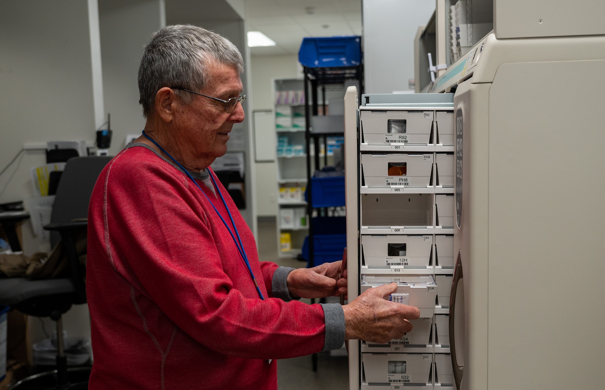 A volunteer works at the pharmacy