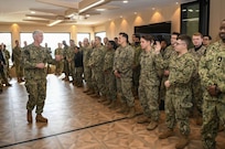 230202-N-ZU848-0186 BUSAN, Republic of Korea (Jan. 18, 2023) Vice Adm. Karl Thomas, commander, U.S. 7th Fleet, takes a question from a Commander, Naval Forces Korea Sailor during an all hands call while visiting the Commander, Republic of Korea Fleet Base in Busan, South Korea. Vice Adm. Thomas was in South Korea to attend the 7th annual Anti-submarine Warfare Committee meeting. (U.S. Navy Photo by Mass Communication Specialist 2nd Class Adam Craft)