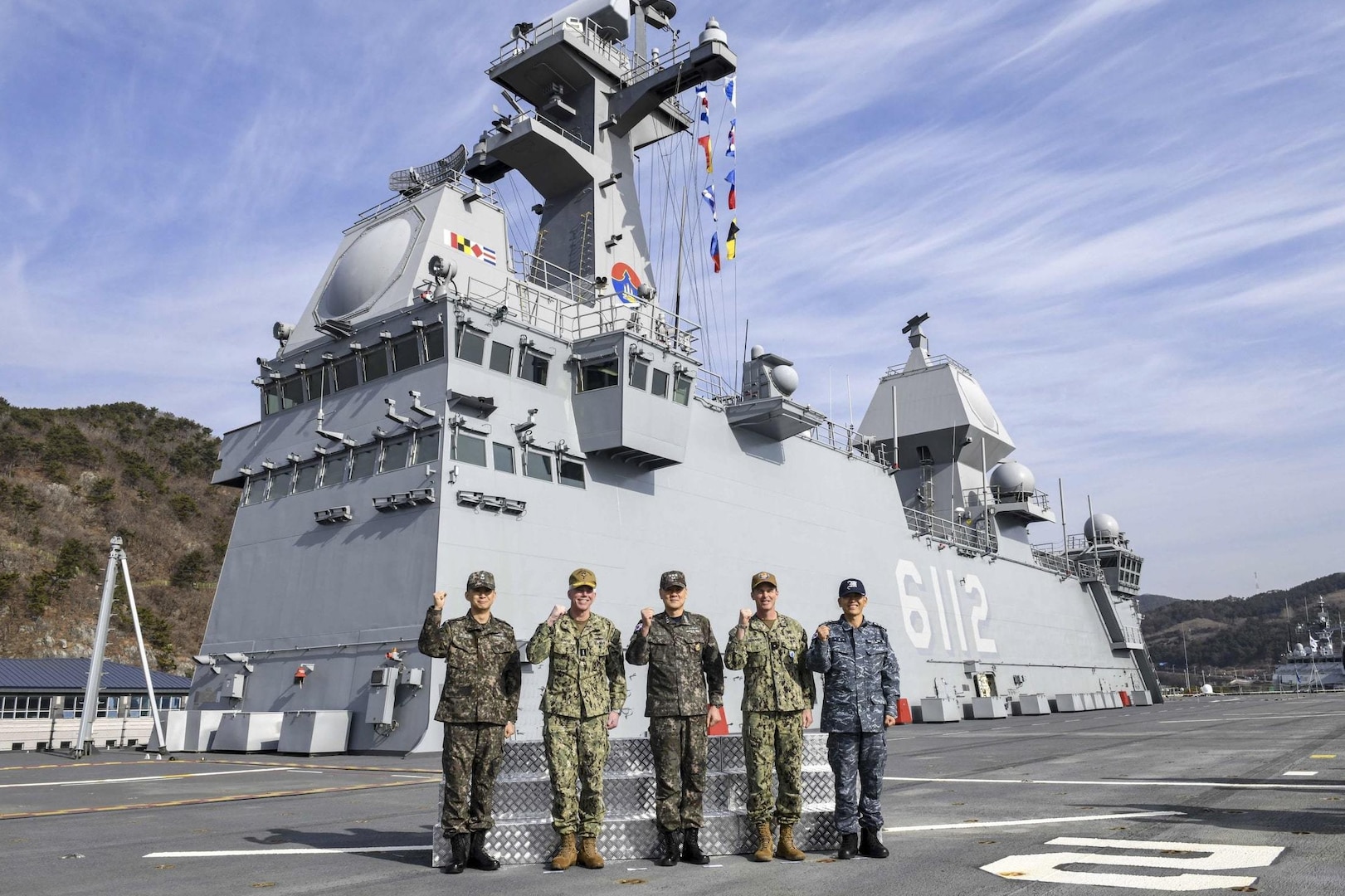 230202-N-ZU710-0062 BUSAN, Republic of Korea (Feb. 2, 2023) Vice Adm. Karl Thomas, commander, U.S. 7th Fleet, poses for a photo with senior Korean and U.S. Navy leadership aboard the Republic of Korea (ROK) Navy Dokdo-class amphibious assault ship ROKS Marado (LPH-6112) in Busan, ROK. Vice Adm. Thomas is in the Republic of Korea to attend the 7th annual Anti-submarine Warfare Cooperation Committee meeting. (U.S. Navy photo by Mass Communication Specialist 2nd Class Michael Chen)