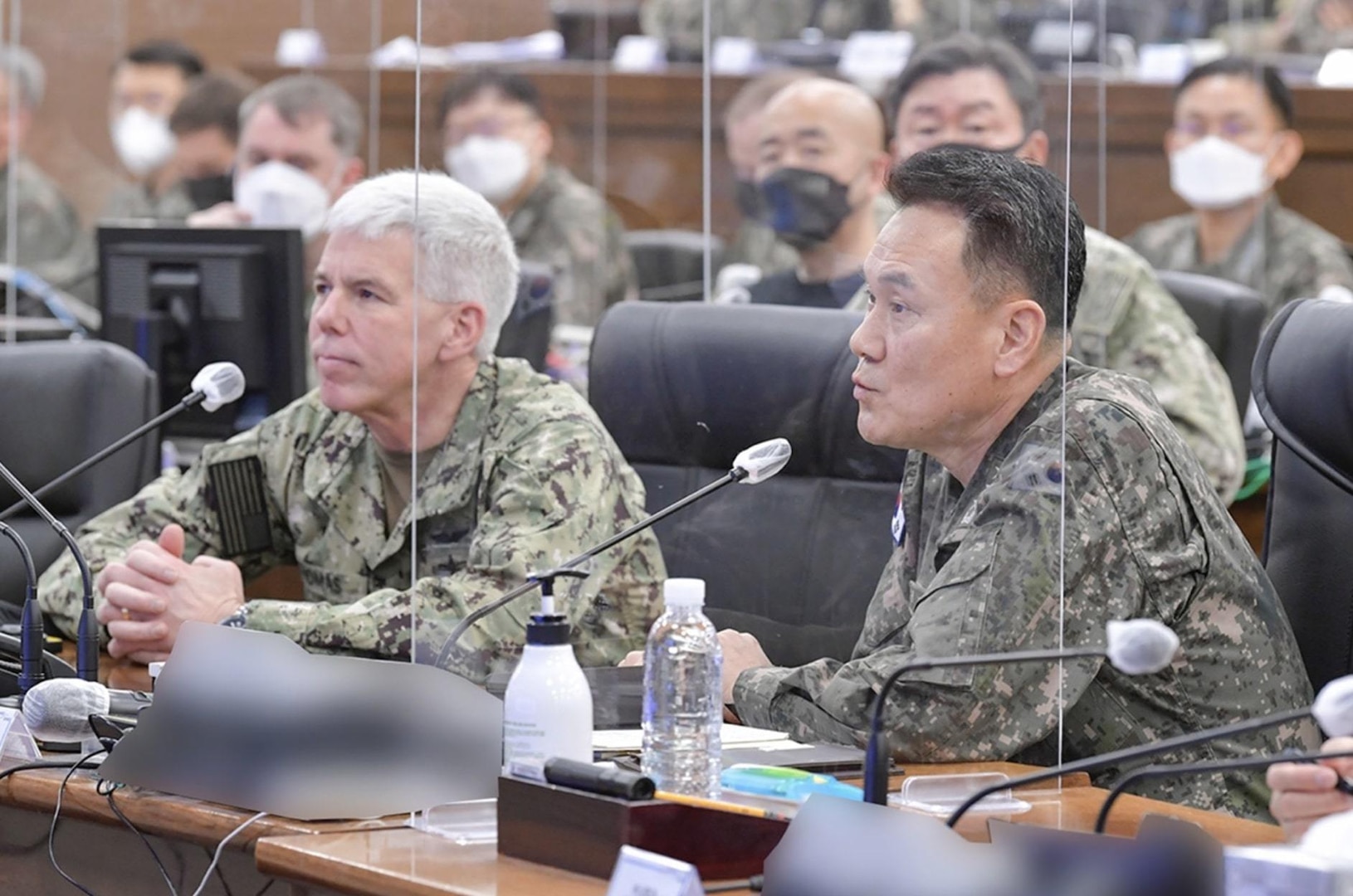 230202-N-SO091-029 Republic of Korea (Feb. 2, 2023) Vice Adm. Karl Thomas, Commander, US 7th Fleet (left) and Vice Admiral Kim Jung-soo, Commander Republic of Korea Fleet (right) receive a combined brief on naval operations in and around the Korean peninsula. Vice Adm. Thomas is in the Republic of Korea to attend the 7th annual Anti-submarine Warfare Cooperation Committee meeting. (Courtesy photo by Commander, ROK Fleet Public Affairs)