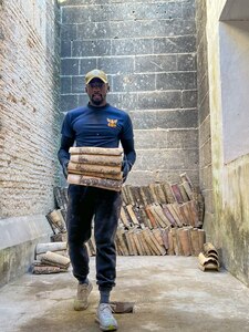 JEREZ DE LA FRONTERA, Spain (Jan. 21, 2023) Seabees assigned to Naval Mobile Construction Battalion (NMCB) 11 prepare to chop firewood during a volunteer event at the Charterhouse of Santa María de la Defensión, Jan. 21, 2023, in Jerez de la Frontera, Spain. NMCB 11 operates as a part of Navy Expeditionary Combat Command and is assigned to Commander, Task Force 68 for deployment across the U.S. Naval Forces Europe-Africa area of operations to defend U.S., allied, and partner interests. (U.S. Navy photo by Mass Communication Specialist 2nd Class James S. Hong)