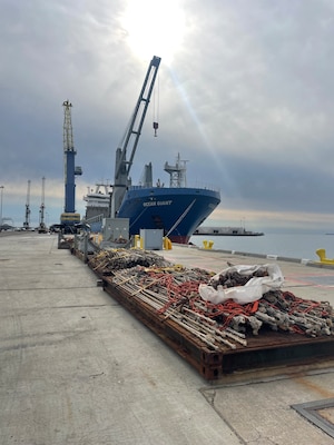 Materials are staged to be loaded onto the Military Sealift Command chartered ship MV Ocean Giant.