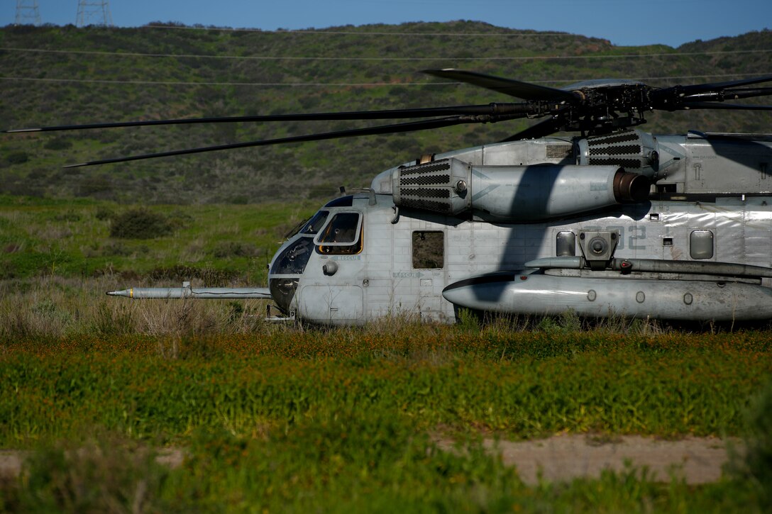 A U.S. Marine Corps CH-53E Super Stallion attached to Marine Heavy Helicopter Squadron (HMH) 361, Marine Aircraft Group 16, 3rd Marine Aircraft Wing, prepares to conduct external lifts during helicopter support team training as part of the Combat Logistics Battalion 15 Marine Corps Combat Readiness Evaluation (MCCRE) at Marine Corps Base Camp Pendleton, California, Jan. 25, 2023. The

purpose of CLB-15’s MCCRE is to evaluate the unit's ability to perform assigned mission essential tasks in preparation for a future deployment. (U.S. Marine Corps photo by Sgt. Smith)