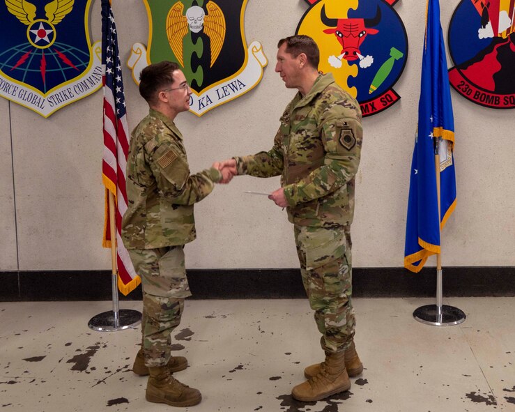 U.S. Air Force Senior Airman Albert Roybal, 5th Aircraft Maintenance Squadron communication navigation mission systems maintainer, receives the first-ever Airman Against Drunk Driving (AADD) Volunteer of the Month Award at Minot Air Force Base, North Dakota, Feb. 2, 2023. Roybal had volunteered 145 hours with AADD over the course of four months. (U.S. Air Force photo by Senior Airman Evan Lichtenhan)