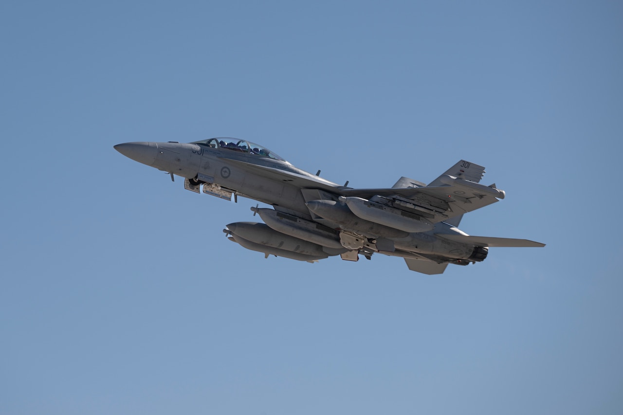 A jet soars into the air.