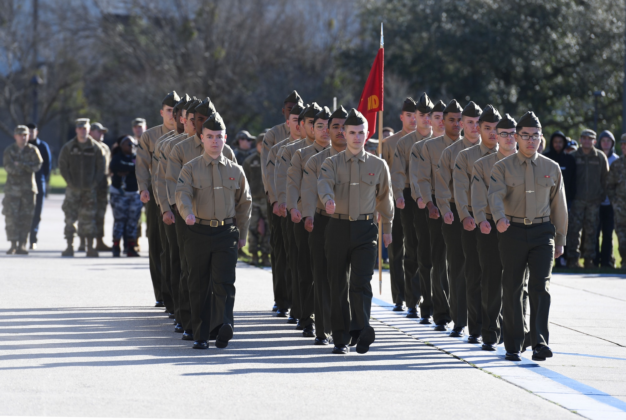 Members of the Keesler Marine Detachment regulation drill team perform during the 81st Training Group drill down on the Levitow Training Support Facility drill pad at Keesler Air Force Base, Mississippi, Feb. 23, 2023.