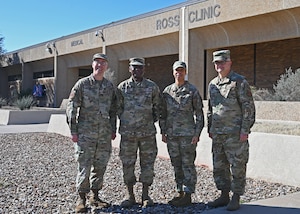 U.S. Air Force Col. Christopher Grussendorf, Air Education and Training Command command surgeon, Chief Master Sgt. Donald Cook, AETC medical enlisted force chief, and 17th Medical Group leadership pose for a photo at Ross Clinic, Texas, Feb. 3, 2023. Grussendorf toured the 17th MDG and met with multiple staff members throughout the clinic. (U.S. Air Force photo by Airman 1st Class Zachary Heimbuch)