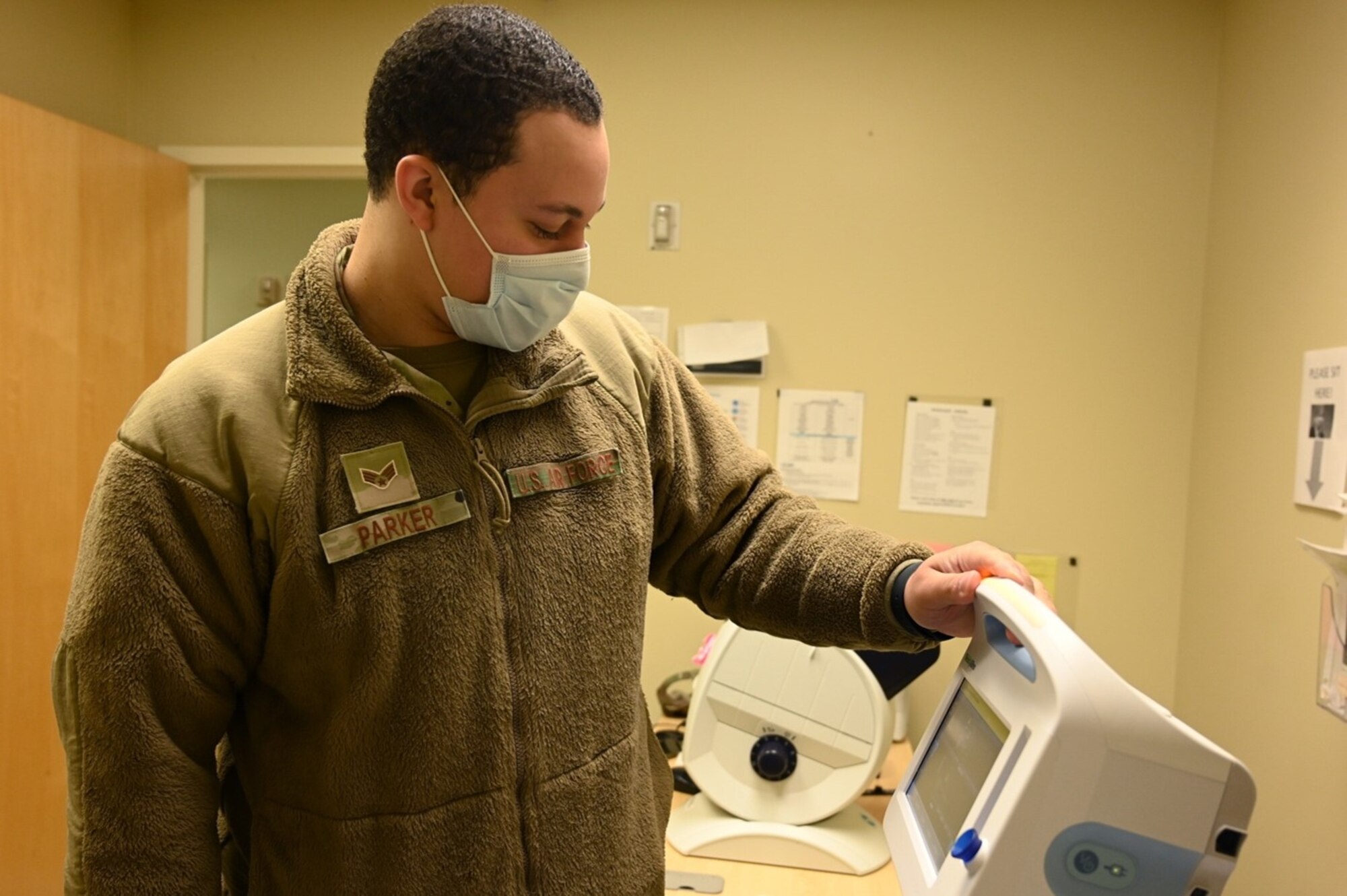 U.S. Air Force Senior Airman Javan Parker, a medical technician with the 62d Medical Squadron, checks a patient’s vitals at Joint Base Lewis-McChord, Washington, Feb. 3, 2023. The 62d MDS, located in the McChord Clinic, provides quality healthcare services to promote fit, resilient, and ready forces. (U.S. Air Force photo by Senior Airman Callie Norton)