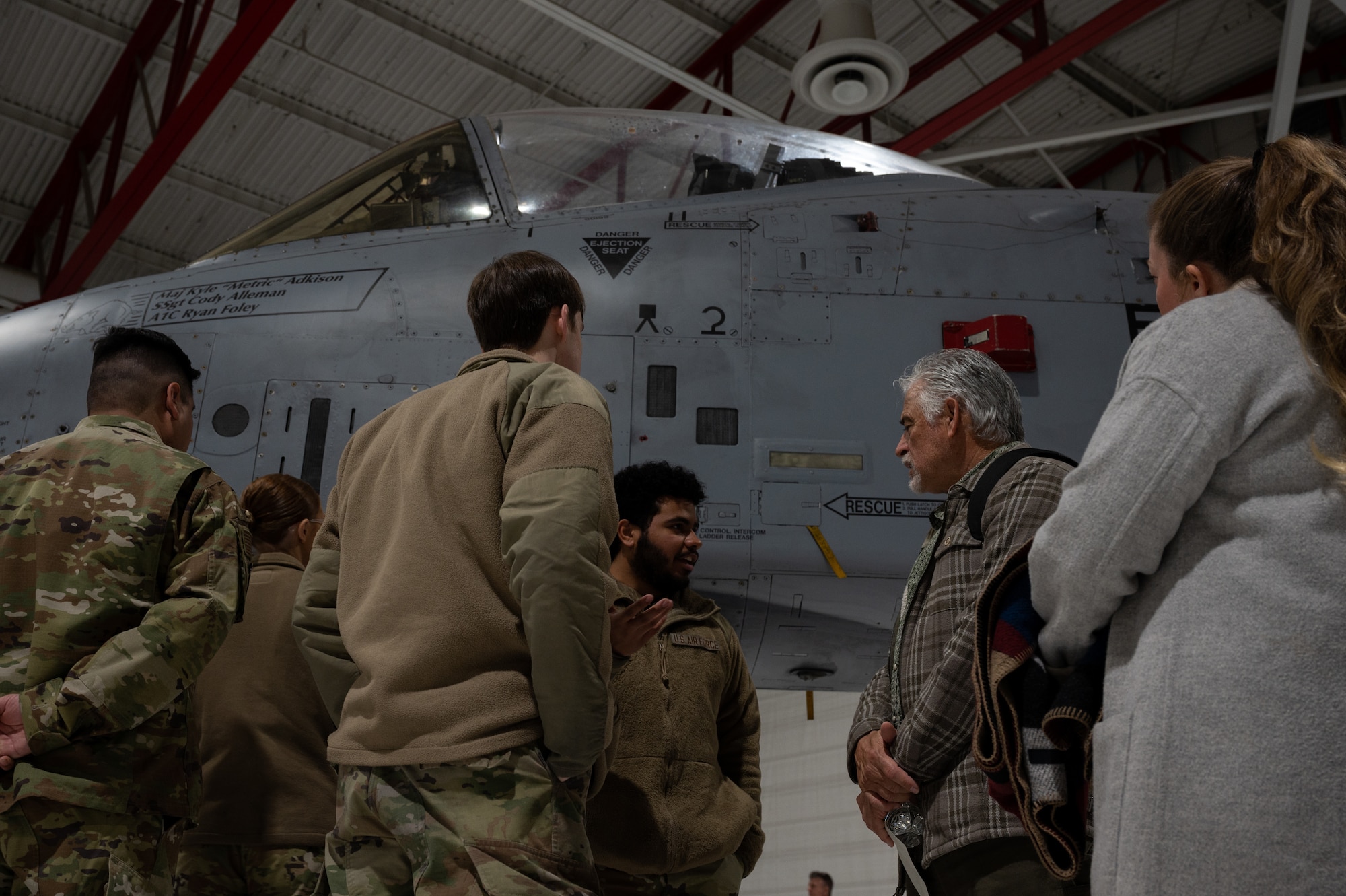 Airmen talking to civilians