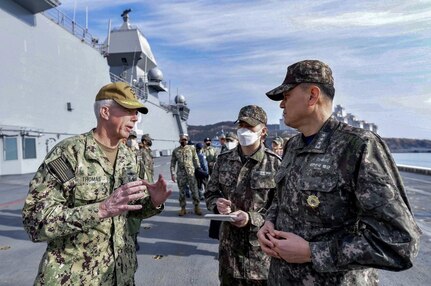 230202-N-SO091-460 BUSAN, Republic of Korea (Feb. 2, 2023) Vice Admiral Kim Jung-soo, Commander Republic of Korea Fleet leads Vice Adm. Karl Thomas, Commander, US 7th Fleet and Staff on a tour of the flight deck aboard the Republic of Korea Navy Dokdo-class Amphibious Assault Ship ROKS Marado (LPH-6112) in Busan, ROK. Vice Adm. Thomas is in the Republic of Korea to attend the 7th annual Anti-submarine Warfare Cooperation Committee meeting. (Courtesy photo by Commander, ROK Fleet Public Affairs)