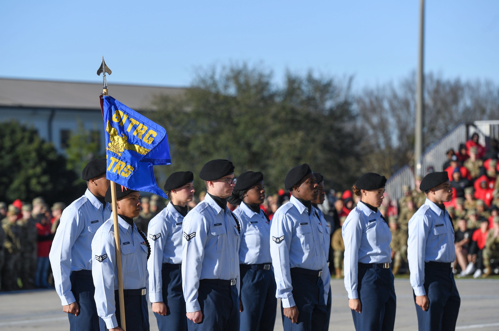 Members of the 335th Training Squadron regulation drill team perform during the 81st Training Group drill down on the Levitow Training Support Facility drill pad at Keesler Air Force Base, Mississippi, Feb. 23, 2023.