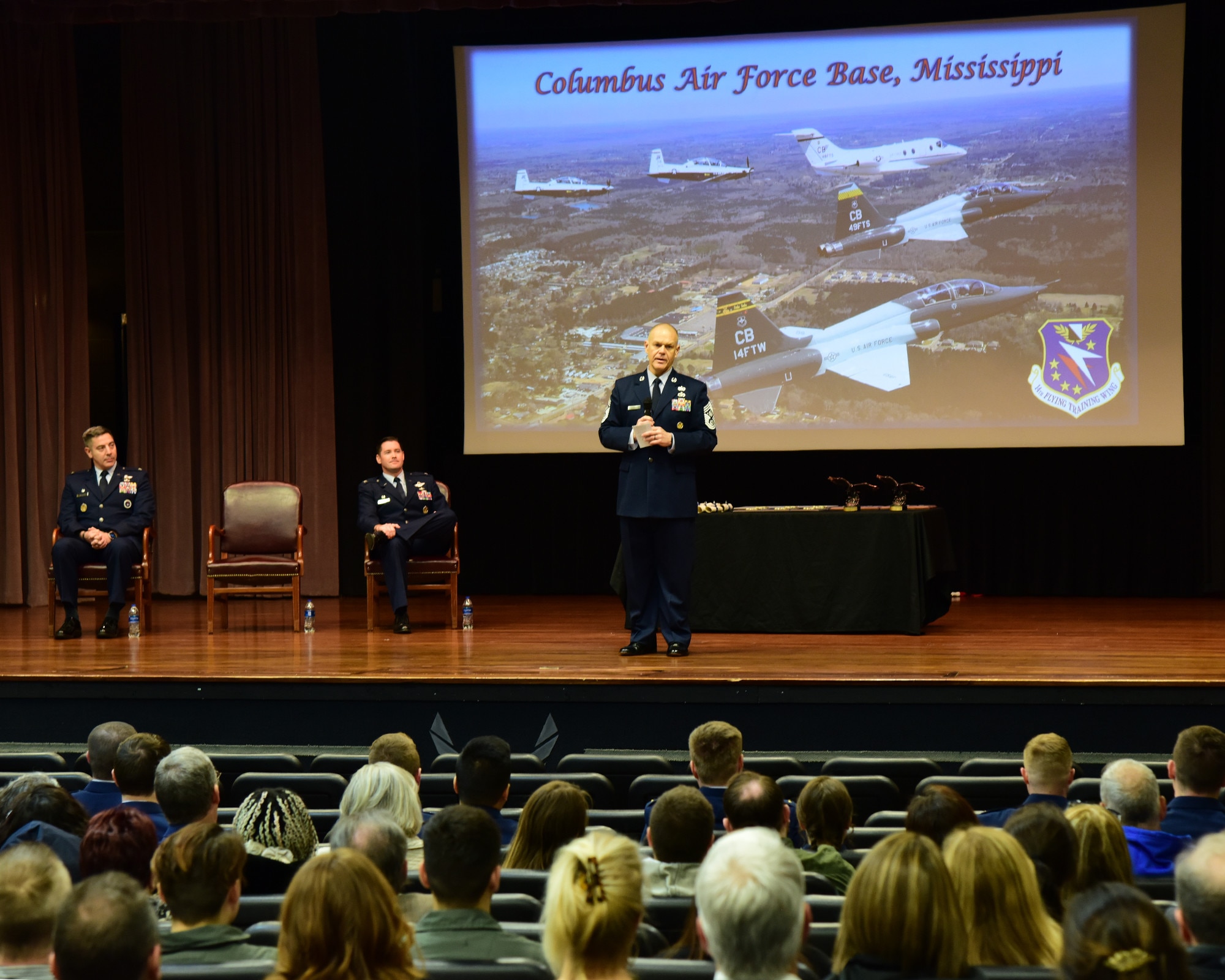 Chief Master Sergeant of the Air Force #16 (retired), James A. Roy, addresses  graduating Undergraduate Pilot Training classes 23-04 AU and 23-05, as their keynote speaker, February 3, 2023, at Columbus Air Force Base. Roy is one of the only enlisted Airmen to speak at a pilot graduation. (U.S. Air Force photo by Melissa Duncan-Doublin)