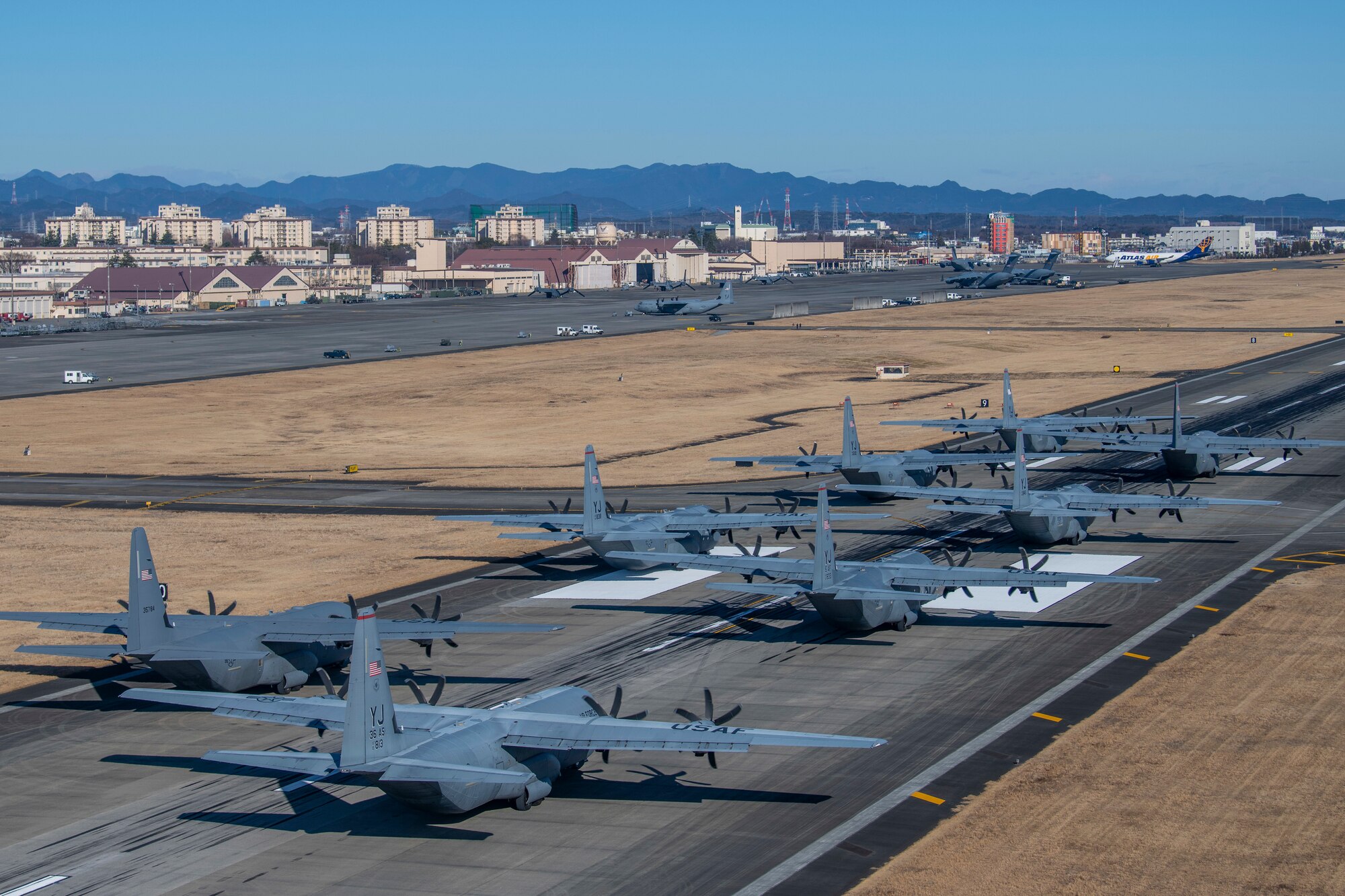eight planes line up for take off