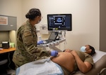 Maj. Hannah Valdes-Chenoweth, 959th Surgical Operations Squadron obstetrician and gynecologist, conducts an ultrasound in the Women’s Health Clinic at Wilford Hall Surgical Ambulatory Center, Joint Base San Antonio-Lackland, Texas, Feb. 2, 2023. The Women’s Health Clinic offers annual exams, full-scope gynecology services, obstetric services to include prenatal and postpartum care and a walk-in contraception clinic.  (U.S. Air Force photo by Senior Airman Melody Bordeaux)