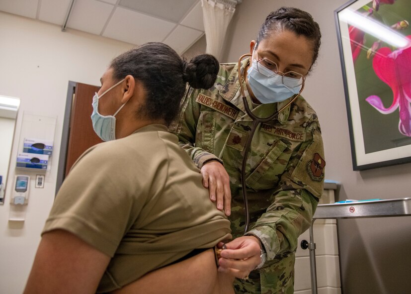 Maj. Hannah Valdes-Chenoweth, 959th Surgical Operations Squadron obstetrician and gynecologist, performs a heart and lung exam in the Women’s Health Clinic at Wilford Hall Surgical Ambulatory Center, Joint Base San Antonio-Lackland, Texas, Feb. 2, 2023. The Women’s Health Clinic offers annual exams, full-scope gynecology services, obstetric services to include prenatal and postpartum care and a walk-in contraception clinic. (U.S. Air Force photo by Senior Airman Melody Bordeaux)