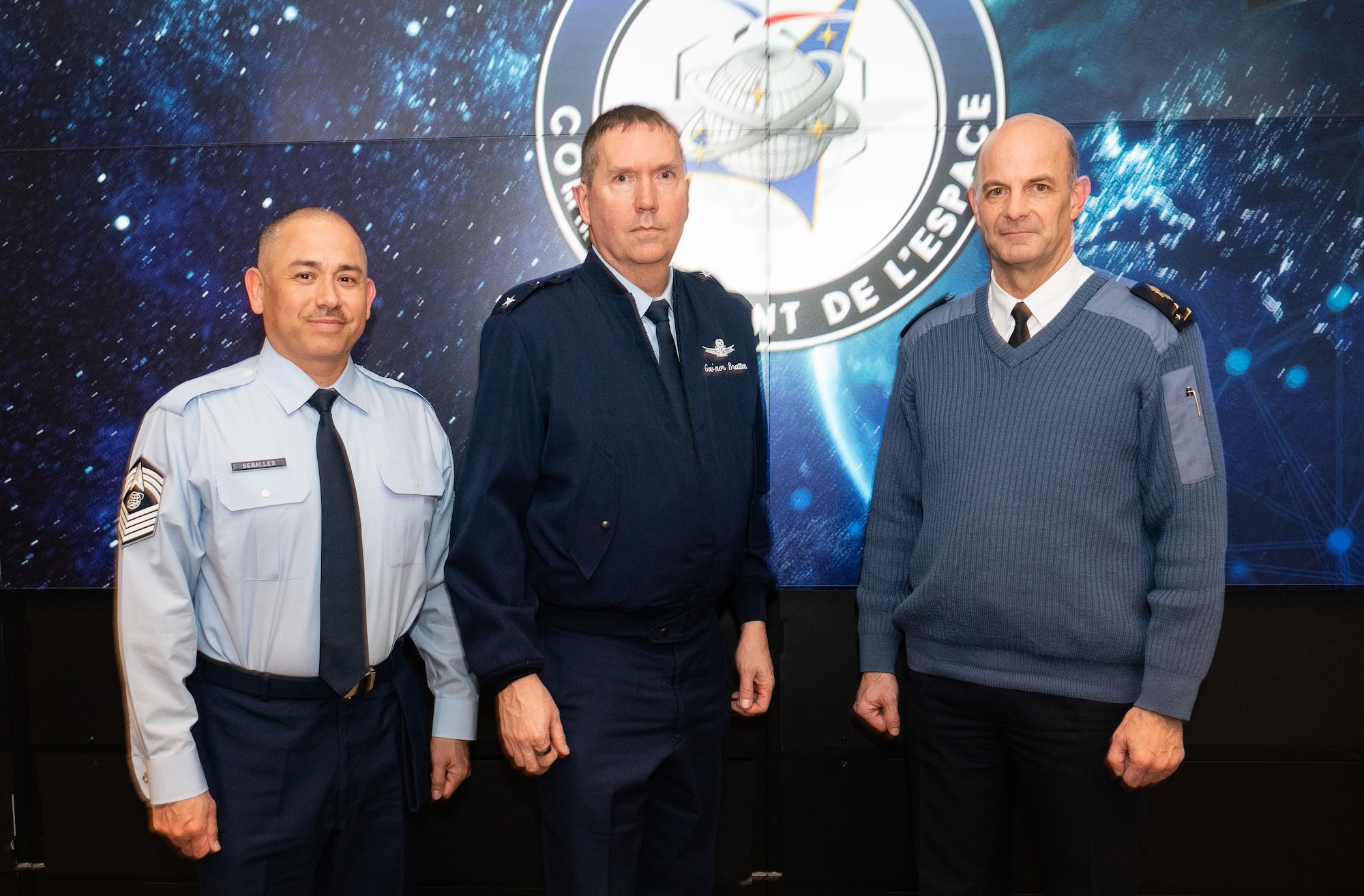 (From left to right) Chief Master Sgt. James Seballes, senior enlisted leader of Space Training and Readiness Command, Maj. Gen. Shawn Bratton, commander of STARCOM, and French Maj. Gen. Philippe Adam, commander of French Space Command, pose for a photo at the Ministry of Armed Forces in Paris, France, Jan. 30, 2023. Their discussions focused on advancing shared objectives including better information sharing, developing mutual education and training opportunities, and advancing toward substantive combined operations in the space domain. (U.S. Air Force photo by 1st Lt. Charles Rivezzo)