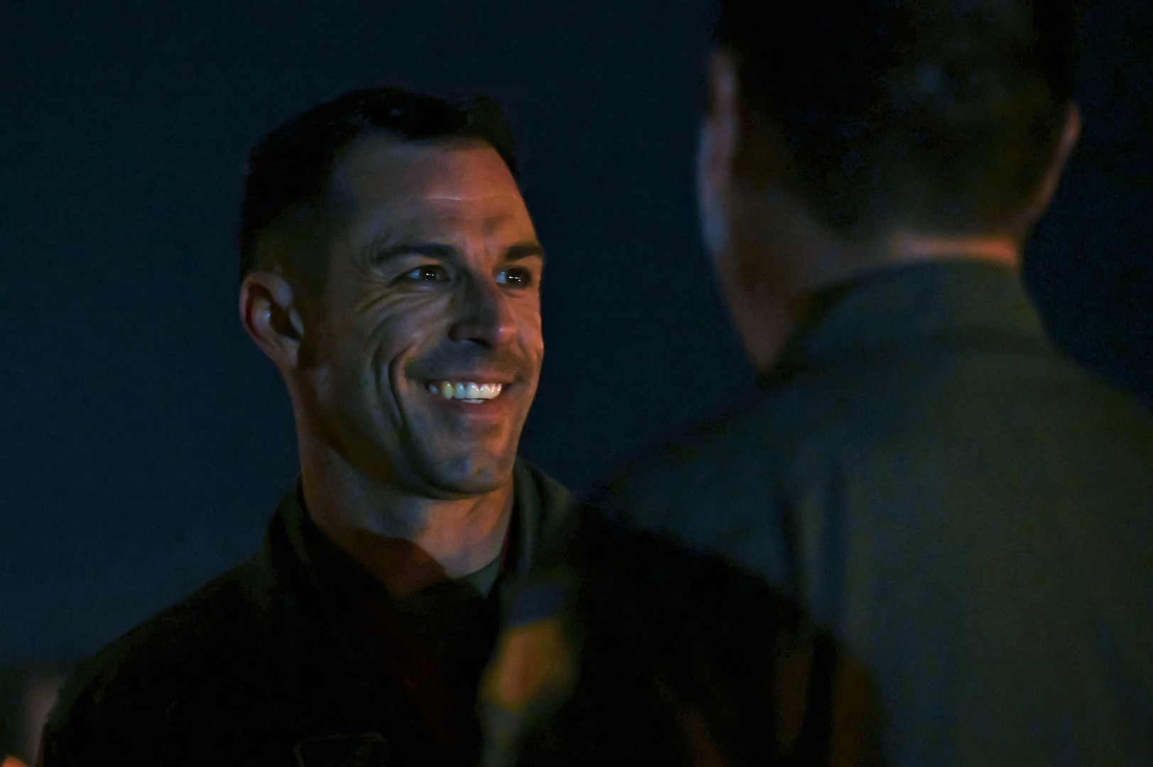 U.S. Air Force Lt. Col. Ross Hobbs, 34th Expeditionary Bomb Squadron commander, smiles after arriving for a Bomber Task Force deployment at Andersen Air Force Base, Guam, Feb. 1, 2023.