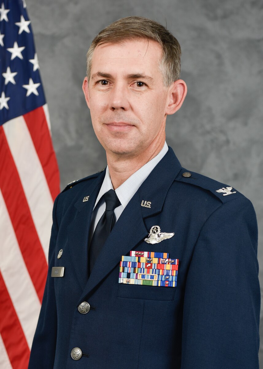 Col. Troy L. Ogle poses for an official photo.