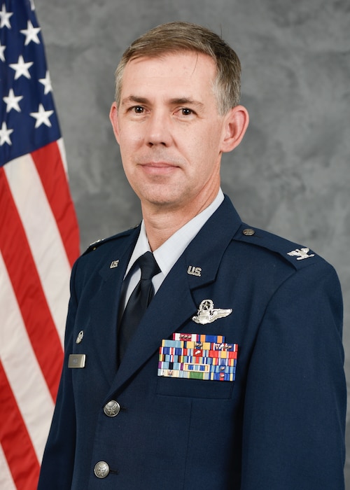 Col. Troy L. Ogle poses for an official photo.