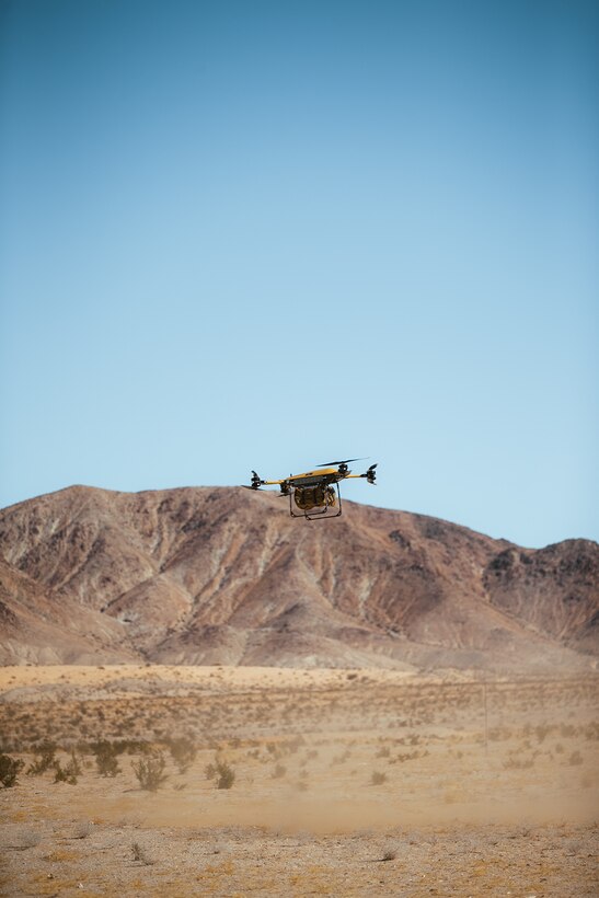 U.S. Marines with 3d Marine Littoral Regiment, 3d Marine Division, employ a Tactical Resupply Unmanned Aircraft System (TRUAS) during Marine Littoral Regiment Training Exercise (MLR-TE) at Marine Corps Air Ground Combat Center Twentynine Palms, California, Feb. 1, 2023.