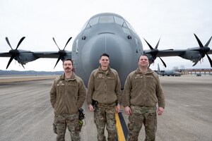 From left, U.S. Air Force Master Sgt. Robert Maddy, Tech. Sgt. Calib Hartline, and Tech. Sgt. Adam Hanshew, members of the 130th Airlift Wing Maintenance Group, pose for a photo on the 130th’s flightline, Jan. 8, 2023. The three maintainers recently discovered a fault in these radio communication systems on all eight aircraft belonging to the 130th and were recognized for their efforts. (U.S. Air National Guard photo by Airman 1st Class Kaden Salmons)
