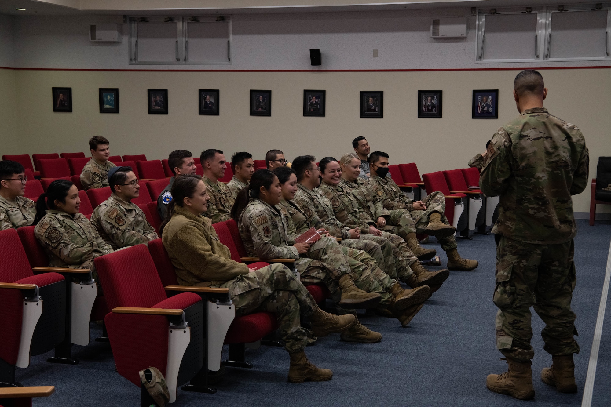 Airmen listen to a presentation.