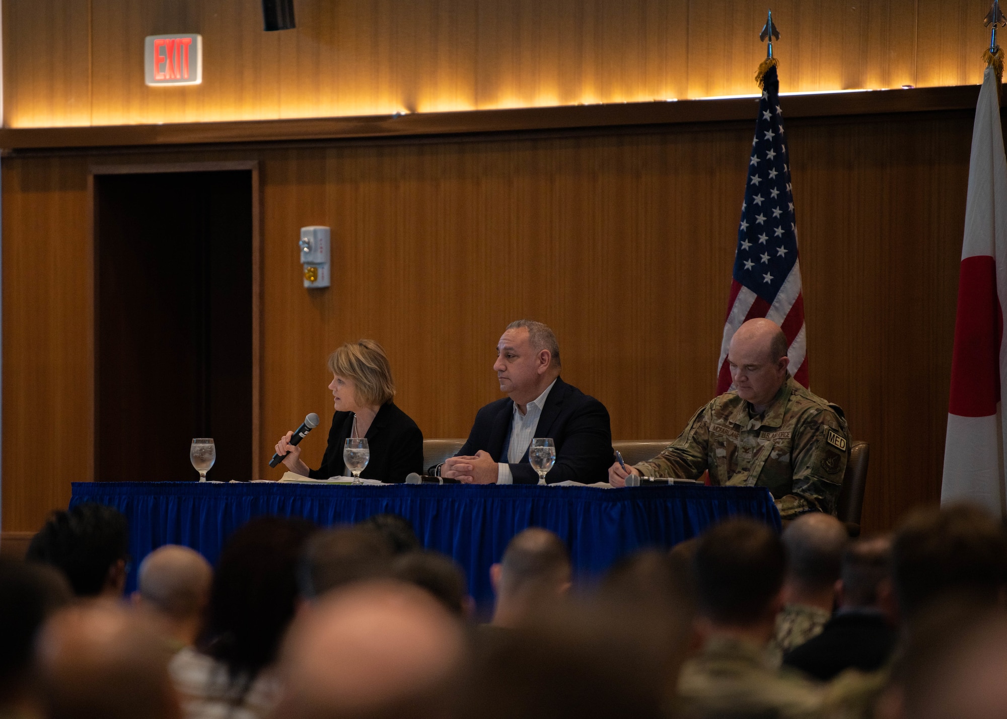 Panel members speak during a Town Hall meeting