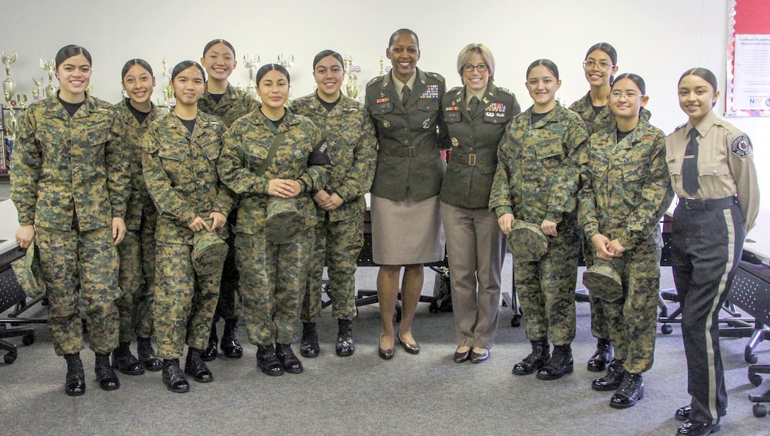 Brig. Gen. Antoinette Gant, the U.S. Army Corps of Engineers' South Pacific Division commander, center, and Col. Julie Balten, the Corps' Los Angeles District commander, gather for a photo with an all-female group of students at Southeast Academy High School Jan. 13 in Norwalk, California.