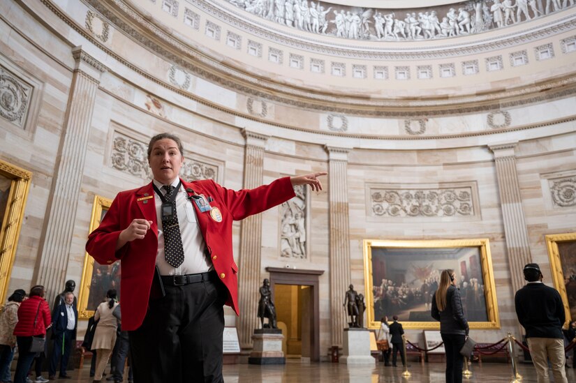 Nora O’Reilly, visitor guide at the United States Capitol Visitor Center, explains the importance of the Capitol Rotunda to Joint Base Anacostia-Bolling’s 2022 Annual Award nominees during a tour on Feb. 1, 2023, Washington D.C. The Capitol Rotunda is a room used for a variety of important events, from dedicating works of art to paying final tribute to the country’s most distinguished citizens. (U.S. Air Force photo by Jason Treffry)