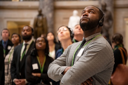 U.S. Air Force Master Sgt. Antonio Lofton, U.S. Air Force Honor Guard Drill Team flight chief, looks up at historic works of art during a guided tour at the U.S. Capitol, Feb 1, 2023, Washington, D.C. Lofton attended the tour with Joint Base Anacostia-Bolling’s 2022 Annual Award nominees. (U.S. Air Force photo by Jason Treffry)