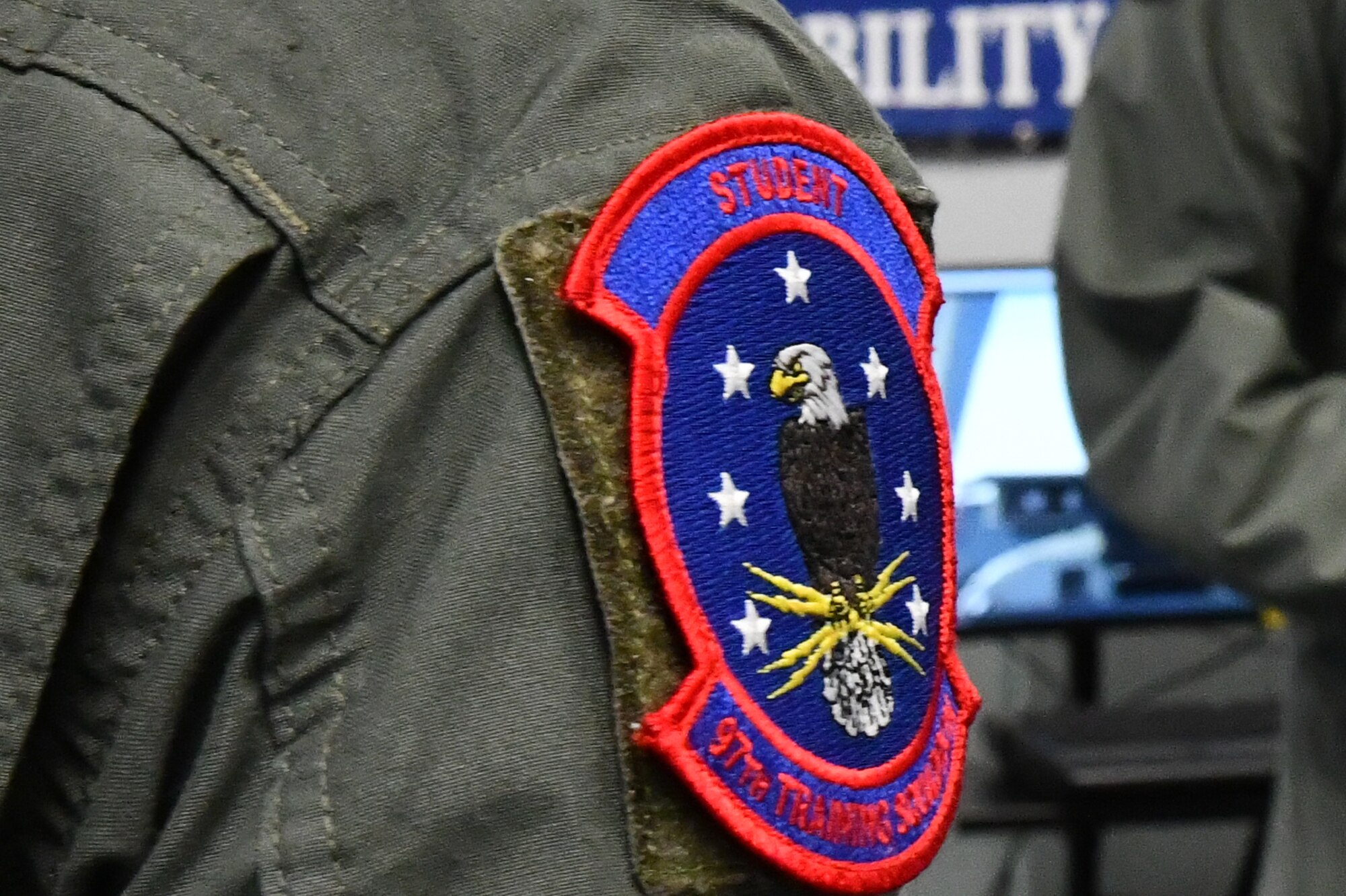 A 97th Training Squadron (TRS) patch is shown at Altus Air Force Base, Oklahoma, Jan. 26, 2023. The 97th TRS graduated 2,031 students in fiscal year 2022, the highest number in 15 years. (U.S. Air Force photo by Airman 1st Class Miyah Gray)
