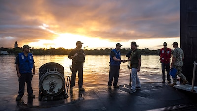 U.S. Representative Ed Case, Hawaii's First Congressional District, greets Sailors aboard the Virginia-class fast-attack submarine USS North Carolina (SSN 777) before touring the boat off the coast of Pearl Harbor, Hawaii, Jan. 15, 2023. USS North Carolina is the fourth submarine of the Virginia-class; the first class designated and built post-Cold War in order to meet the challenges of the 21st century, and has improved stealth; sophisticated surveillance capabilities, and special warfare enhancements that enable it to meet the Navy's multi-mission requirements. (U.S. Navy photo by Mass Communication Specialist 1st Class Scott Barnes)