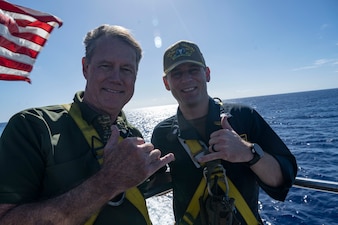 U.S. Representative Ed Case, Hawaii's First Congressional District, poses for a photo with Cmdr. Tad Robbins, commanding officer of the Virginia-class fast-attack submarine USS North Carolina (SSN 777), while touring the North Carolina off the coast of Pearl Harbor, Hawaii, Jan. 15, 2023. USS North Carolina is the fourth submarine of the Virginia-class; the first class designated and built post-Cold War in order to meet the challenges of the 21st century, and has improved stealth; sophisticated surveillance capabilities, and special warfare enhancements that enable it to meet the Navy's multi-mission requirements