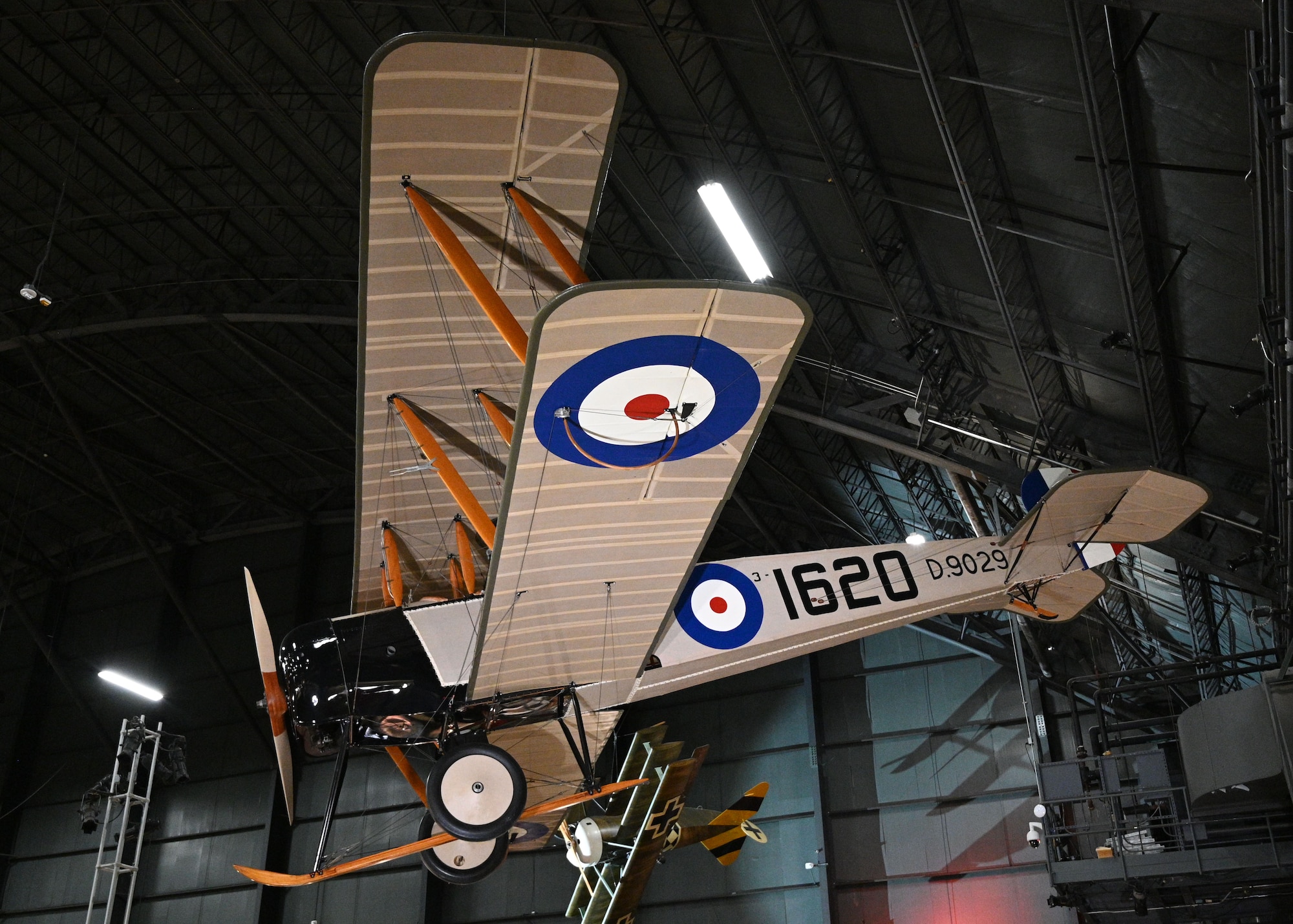 Avro 504K being lifted into position by a crane.