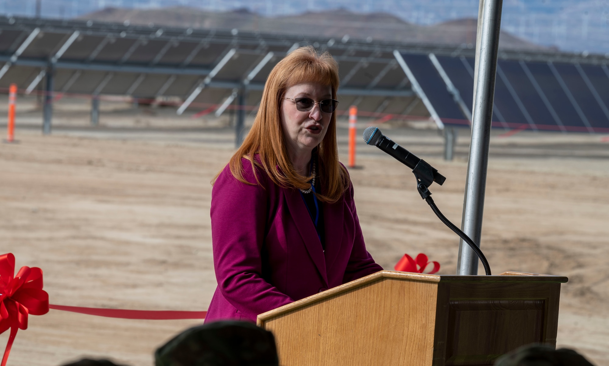 Nancy J. Balkus, Deputy Assistant Secretary of the Air Force, (Environment, Safety and Agriculture), speaks at the Edwards Solar Enhanced Use Lease Project ribbon cutting ceremony commemorating the largest private-public collaboration in Department of Defense history at Edwards Air Force Base, California, Feb. 2.
