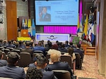 Photo of  Col. Lauren Courchaine, 37th Training Wing commander as she speaks during Cyber Wings 2022 in Bogotá, Colombia, Nov. 25, 2022.
