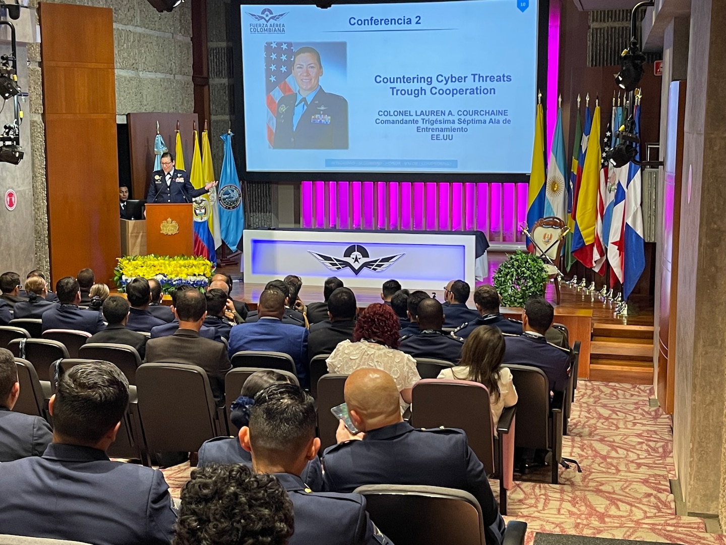 Photo of  Col. Lauren Courchaine, 37th Training Wing commander as she speaks during Cyber Wings 2022 in Bogotá, Colombia, Nov. 25, 2022.