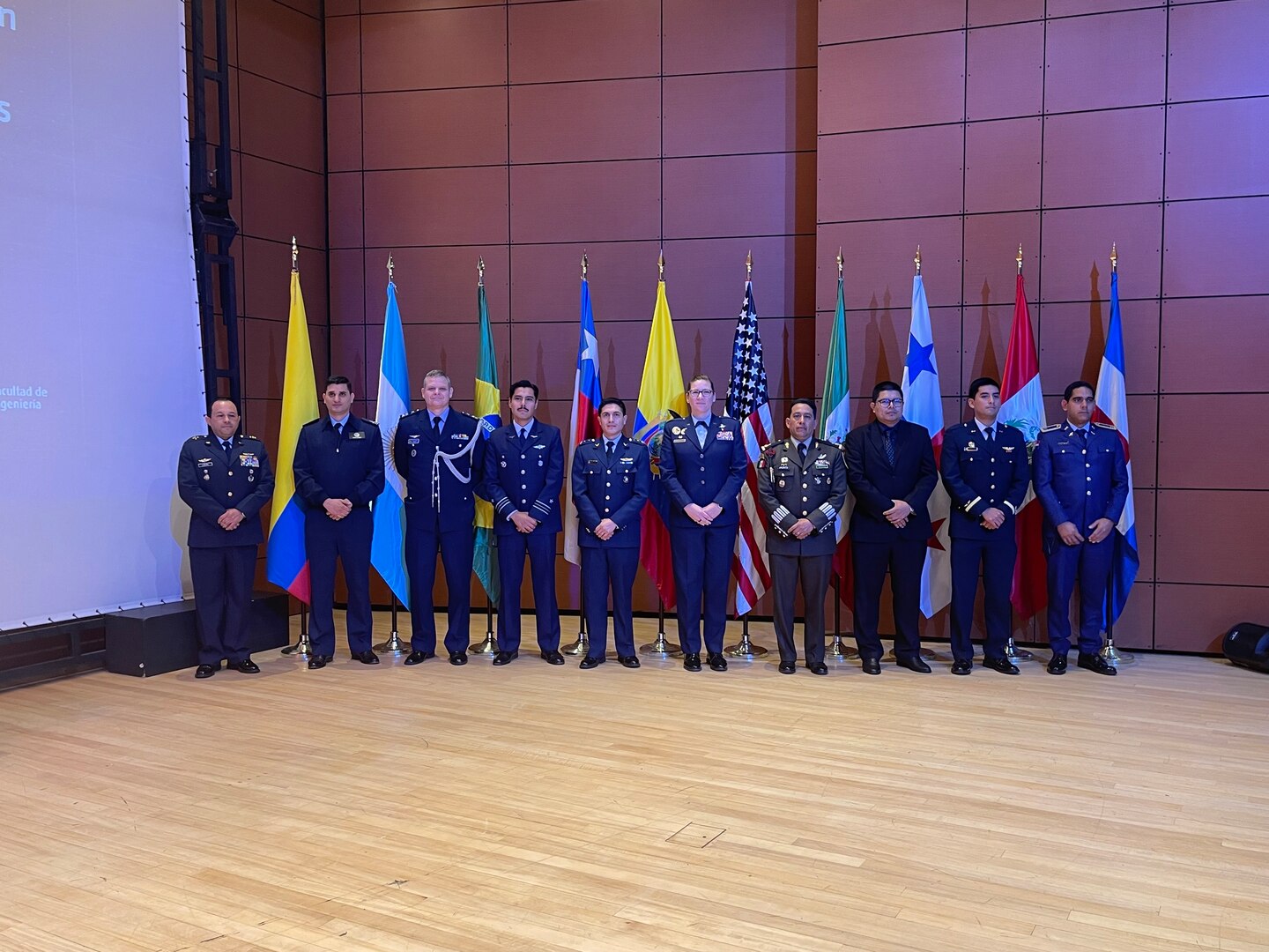 Photo of Col. Lauren Courchaine with representatives across Latin American countries.