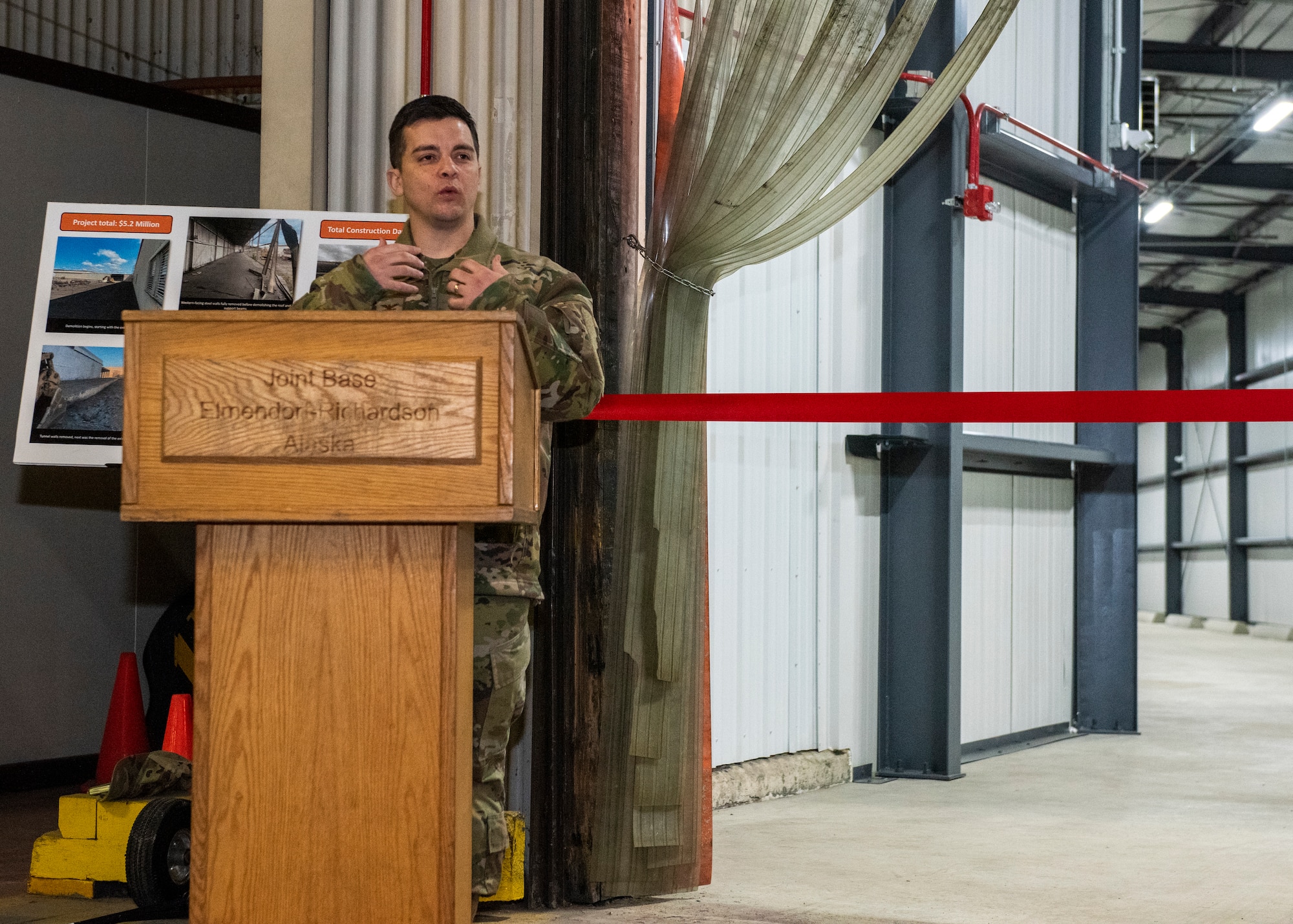 U.S. Air Force Col. David Wilson, Joint Base Elmendorf-Richardson and 673d Air Base Wing commander, speaks at the opening of a supply tunnel at Joint Base Elmendorf-Richardson, Alaska, Feb. 3, 2023. The $5.2 million project was designed to ease the warehousing and distribution of assets between the 673d Logistics Readiness Group and the 673d Medical Group, providing the ability to transport supplies and equipment from one warehouse to another without delay. (U.S. Air Force photo by Airman 1st Class Moises Vasquez)