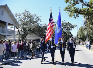 Members of the Keesler Air Force Base Honor Guard lead the Ocean Springs Elks Mardi Gras Parade at Ocean Springs, Mississippi, Feb. 4, 2023.