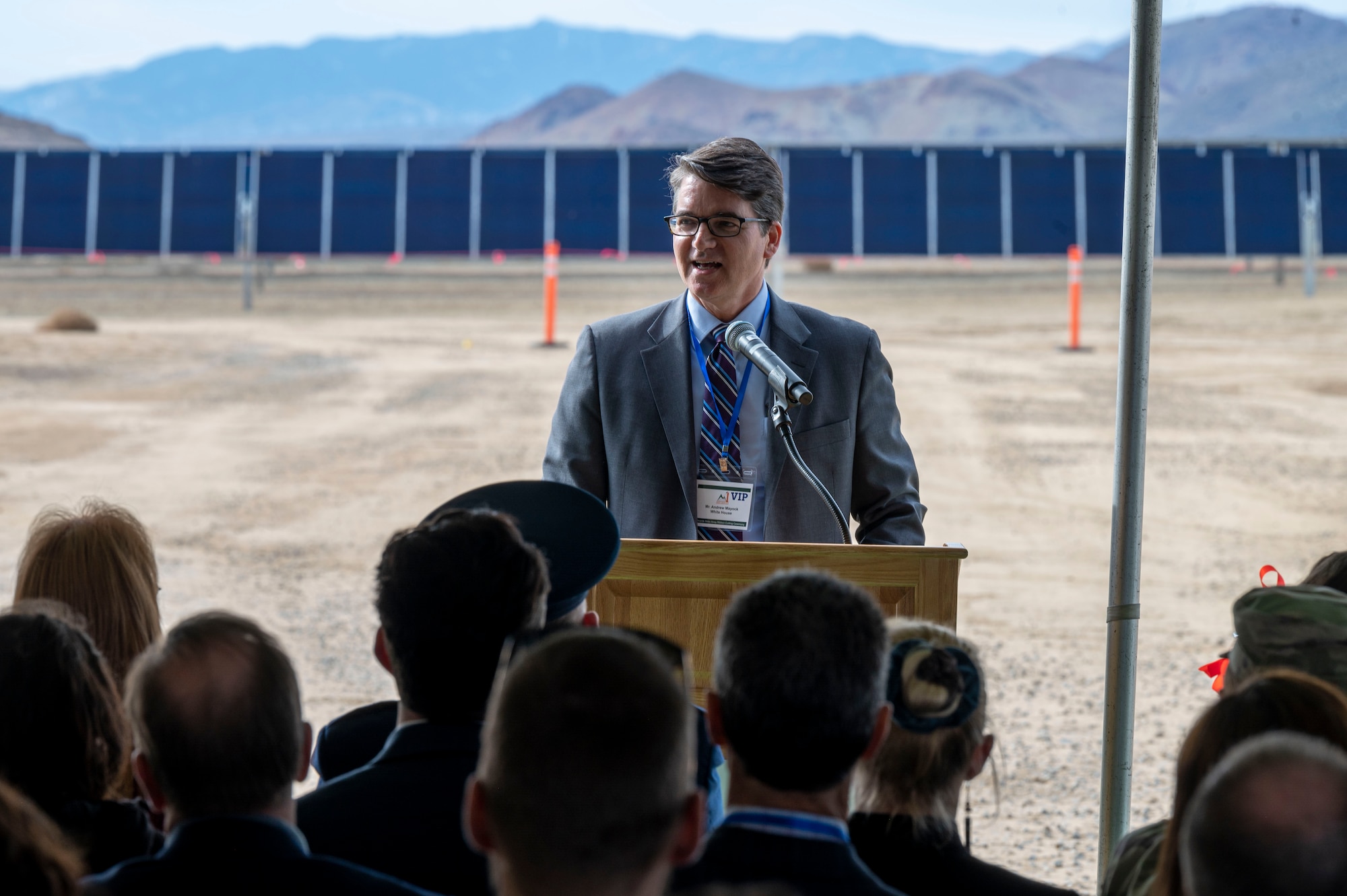 Andrew Mayock, Federal Chief Sustainability Officer, White House Council on Environmental Quality, speaks at the Edwards Solar Enhanced Use Lease Project ribbon cutting ceremony commemorating the largest private-public collaboration in Department of Defense history at Edwards Air Force Base, California, Feb. 2.