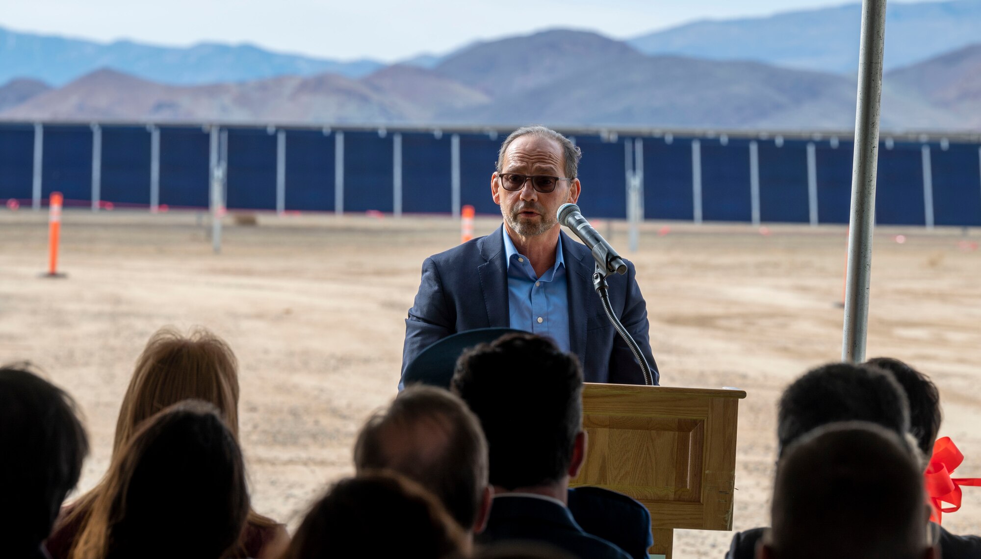 James R. Pagano, Chief Executive Officer, Terra-Gen LLC, speaks at the Edwards Solar Enhanced Use Lease Project ribbon cutting ceremony commemorating the largest private-public collaboration in Department of Defense history at Edwards Air Force Base, California, Feb. 2.