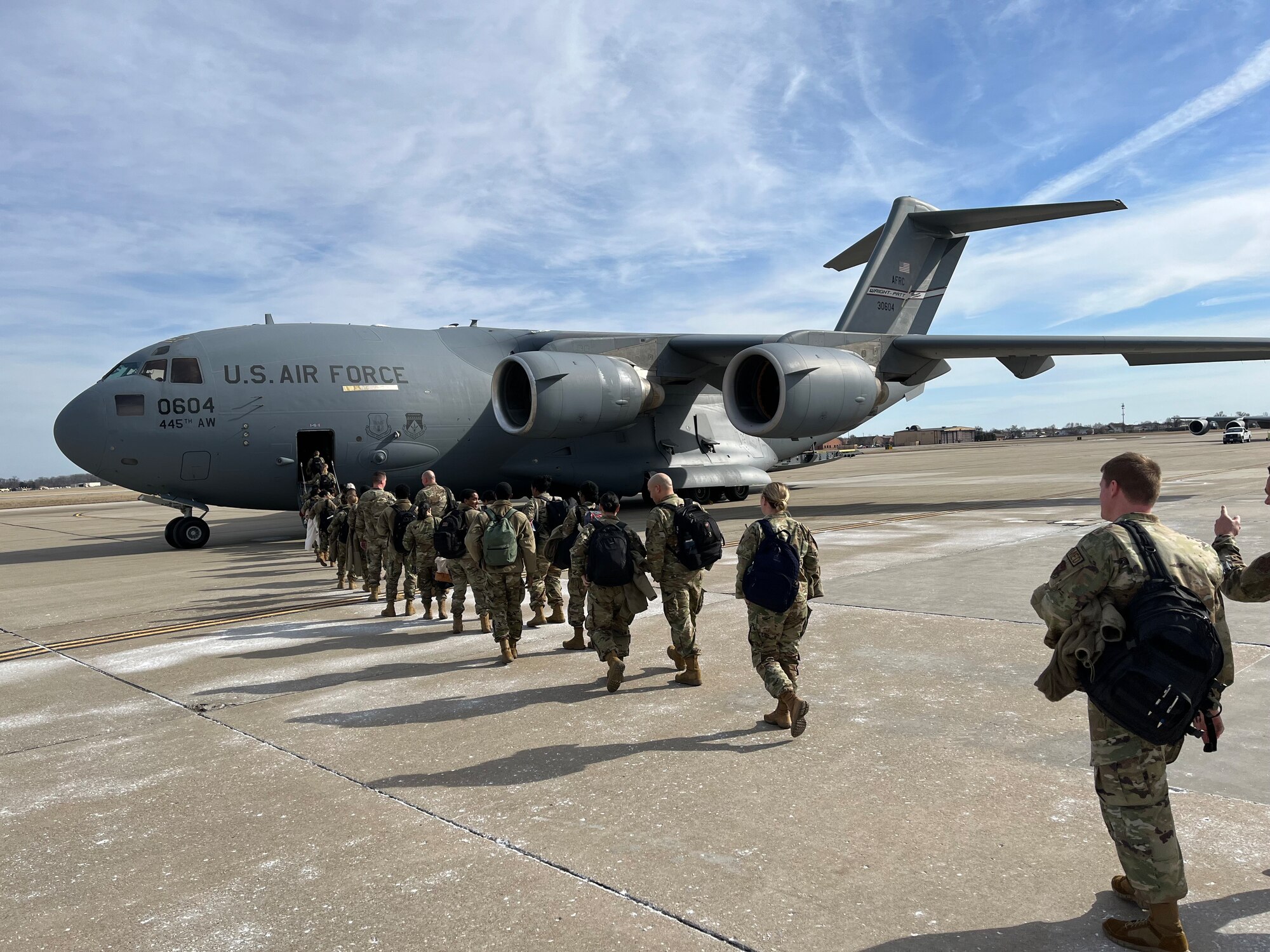 Citizen Airmen from the 932nd Airlift Wing at Scott Air Force Base board a C-17 Globemaster III on Feb. 6, 2023 in support of Operation Joint Endeavour training exercise.