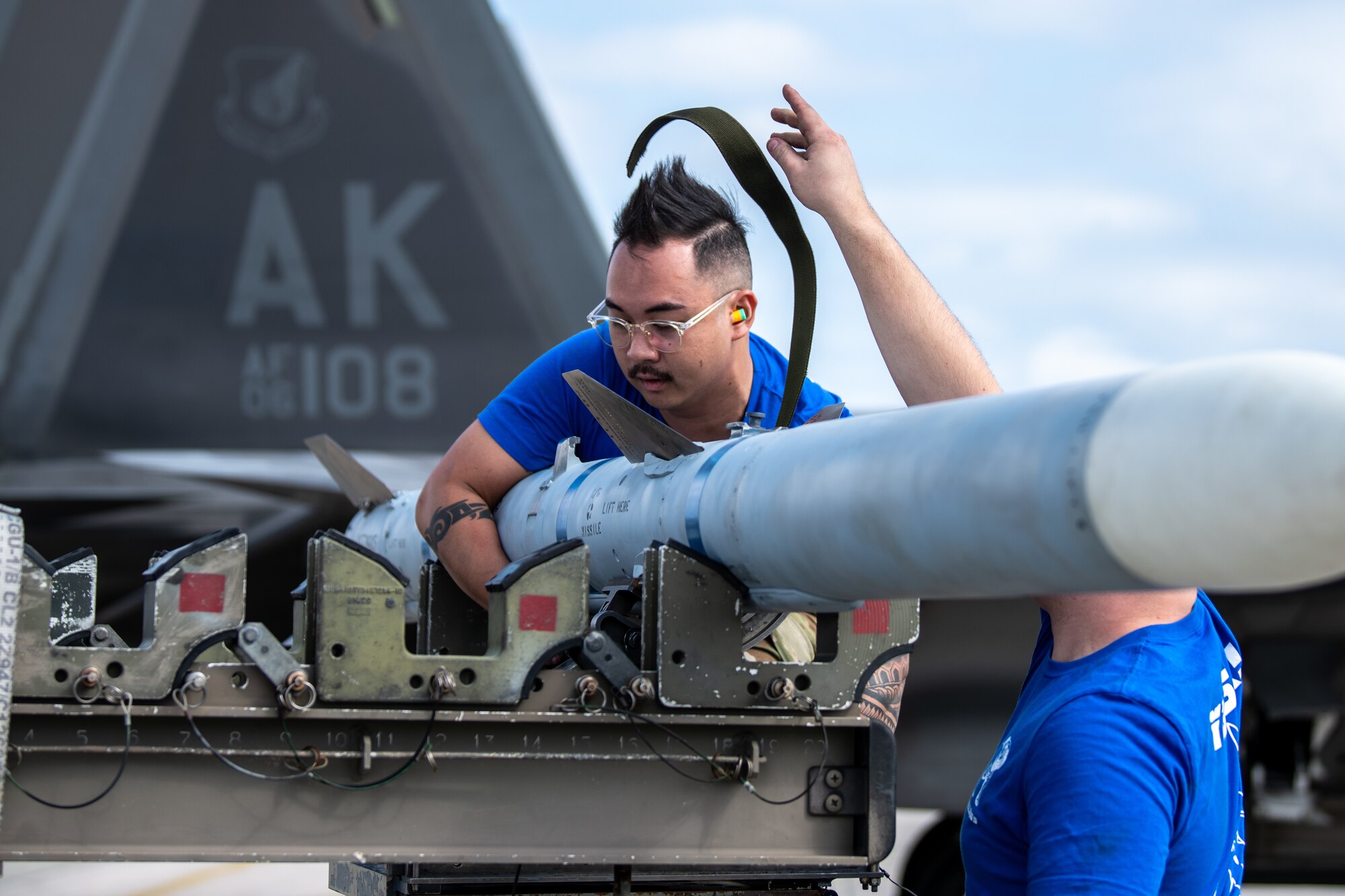 An Airman prepares a missile.