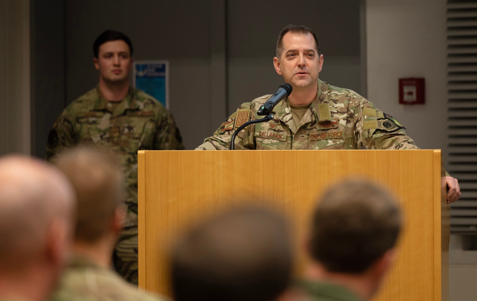 U.S. Air Force Col. Bryan T. Callahan, 435th Air Ground Operations Wing commander, speaks during an award ceremony at Ramstein Air Base, Germany, Feb. 3, 2023.