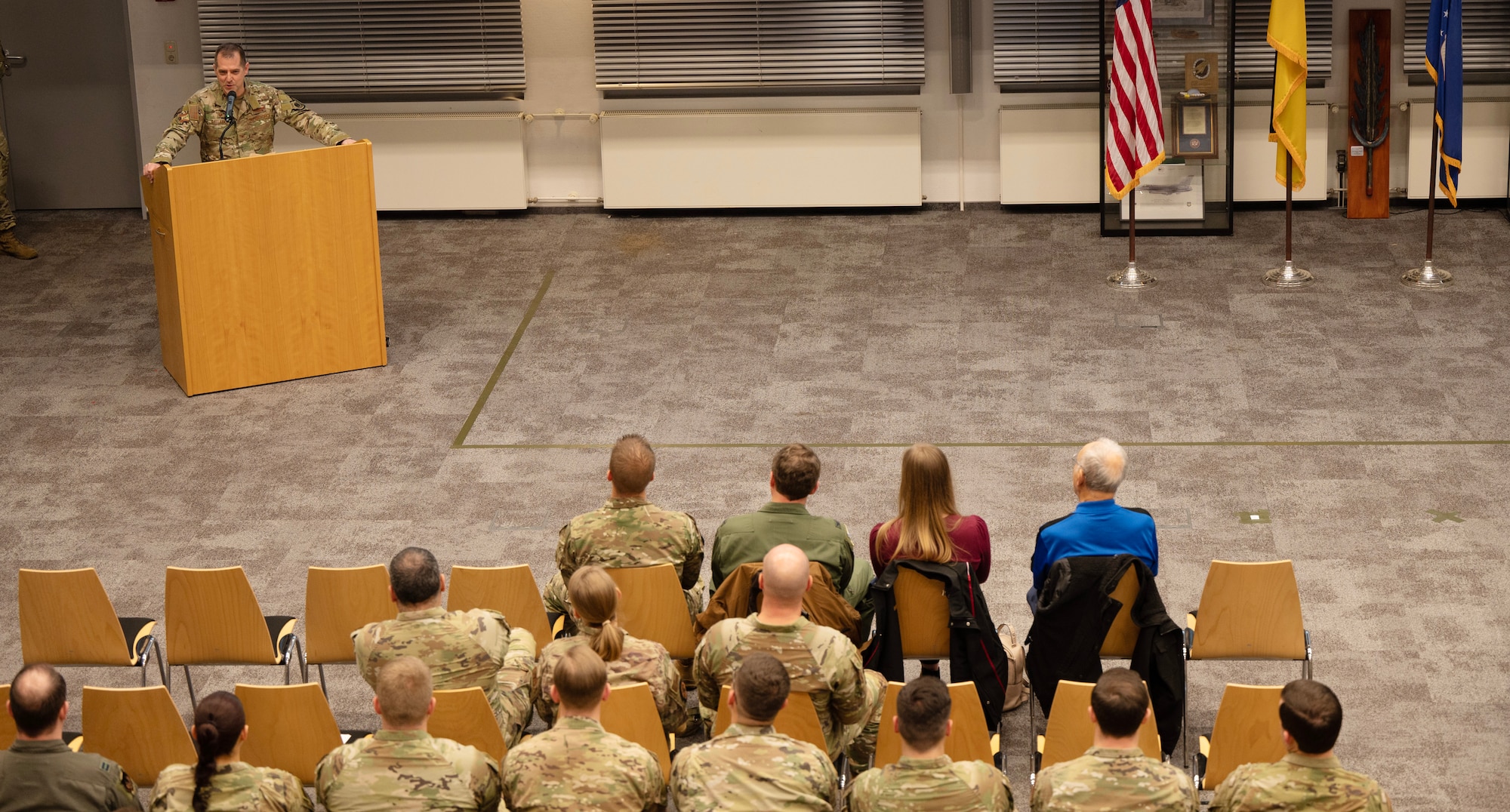 U.S. Air Force Col. Bryan T. Callahan, 435th Air Ground Operations Wing commander, speaks during an award ceremony at Ramstein Air Base, Germany, Feb. 3, 2023.