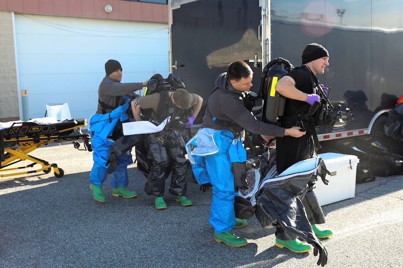 U.S. Army Soldiers with the Pennsylvania National Guard’s 3rd Weapons of Mass Destruction Civil Support Team train in preparation for an upcoming external evaluation Feb. 2 at Sysco of Central Pa. in Harrisburg, Pa. The 22 Soldiers simulated being called upon by civilian authorities to investigate and respond to potential drug production laboratories. Sgt. Kyle Clark and Sgt. Kevin Dodson don hazardous material suits before entering a building to investigate potential simulated drug production laboratories. (U.S. Army National Guard photo by Sgt. 1st Class Zane Craig)